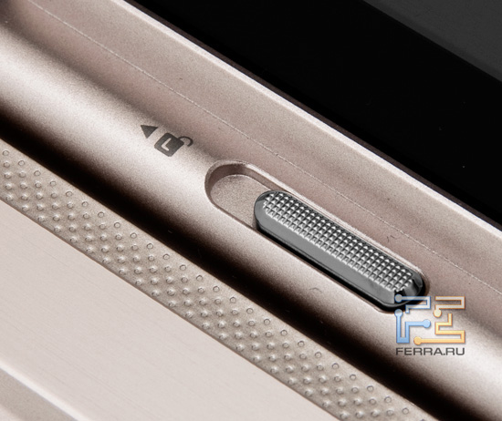 Защелка, позволяющая отсоединить Asus Transformer Prime TF201 от дока