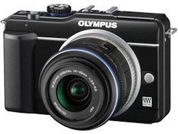 Olympus E-PL1s
Olympus E-PL1s — это доработанная версия камеры PEN E-PL1. В то время, как большинство гибридных фотоаппаратов привлекают эргономикой и удобством работы зеркалок, Olympus E-PL1s примечательна простотой в использовании — фотоаппарат практически неотличим от среднестатистической мыльницы. В отличие от E-PL1, в E-PL1s используется объектив M.ZUIKO DIGITAL 14-42mm F3.5-5.6 II, который весит на 38 грамм меньше. Список усовершенствований не заканчивается на объективе — также расширен диапазон рабочих значений светочувствительности до значения ISO 6400, а аккумулятор заменен на новый, более энергоэффективный. Меню максимально упрощено, что может не понравиться продвинутым пользователям — в конструкции отсутствуют колесики и навигационные диски. Также E-PL1s оснащена встроенной вспышкой, которая возводится по нажатию кнопки или автоматически.
Если быть откровенными, самая сильная сторона фотоаппарата — скромная цена. Экран, корпус, дизайн и объектив из комплекта максимально упрощены. Разница в цене между E-PL1s и, к примеру, E-P2, составляет примерно 6 тысяч рублей. При этом качество изображения на обоих камерах идентично. А на сэкономленные деньги можно купить отличный объектив, как из оптики Micro Four Thirds, так и из большого парка Four Thirds. И на переходное кольцо еще деньги останутся.

Материалы по теме: 
Предварительный обзор Olympus E-PL1. Камеры стандарта Micro Four Thirds стремительно дешевеют.

Olympus E-PL1s
Olympus E-PL1s — это доработанная версия камеры PEN E-PL1. В то время, как большинство гибридных фотоаппаратов привлекают эргономикой и удобством работы зеркалок, Olympus E-PL1s примечательна простотой в использовании — фотоаппарат практически неотличим от среднестатистической мыльницы. В отличие от E-PL1, в E-PL1s используется объектив M.ZUIKO DIGITAL 14-42mm F3.5-5.6 II, который весит на 38 грамм меньше. Список усовершенствований не заканчивается на объективе — также расширен диапазон рабочих значений светочувствительности до значения ISO 6400, а аккумулятор заменен на новый, более энергоэффективный. Меню максимально упрощено, что может не понравиться продвинутым пользователям — в конструкции отсутствуют колесики и навигационные диски. Также E-PL1s оснащена встроенной вспышкой, которая возводится по нажатию кнопки или автоматически.
Если быть откровенными, самая сильная сторона фотоаппарата — скромная цена. Экран, корпус, дизайн и объектив из комплекта максимально упрощены. Разница в цене между E-PL1s и, к примеру, E-P2, составляет примерно 6 тысяч рублей. При этом качество изображения на обоих камерах идентично. А на сэкономленные деньги можно купить отличный объектив, как из оптики Micro Four Thirds, так и из большого парка Four Thirds. И на переходное кольцо еще деньги останутся.

Материалы по теме: 
Предварительный обзор Olympus E-PL1. Камеры стандарта Micro Four Thirds стремительно дешевеют.