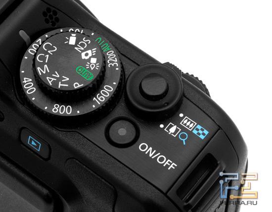Кнопка включения, рычажок зума, селектор режиов съемки и выдержки на Canon Powershot G12