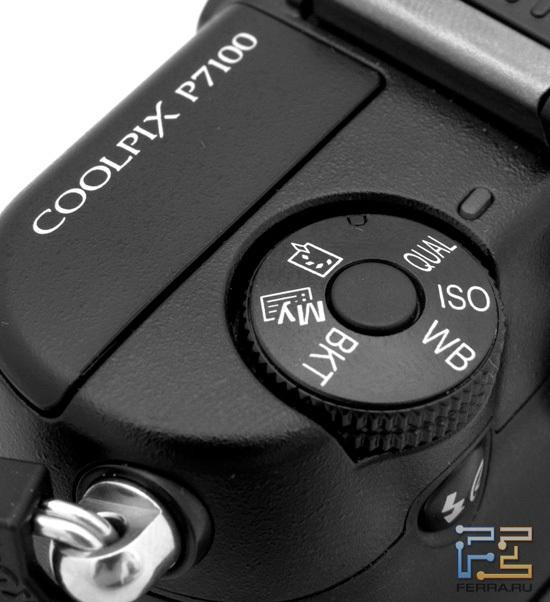 Дополнительный скроллер, расположенный в левой части верхней панели Nikon Coolpix P7100