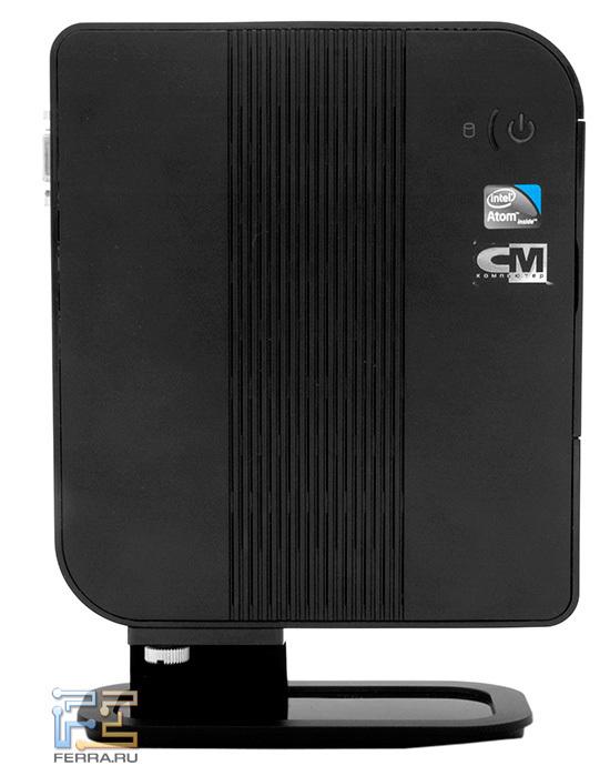 Установленный на настольную подставку неттоп. Вид слева…