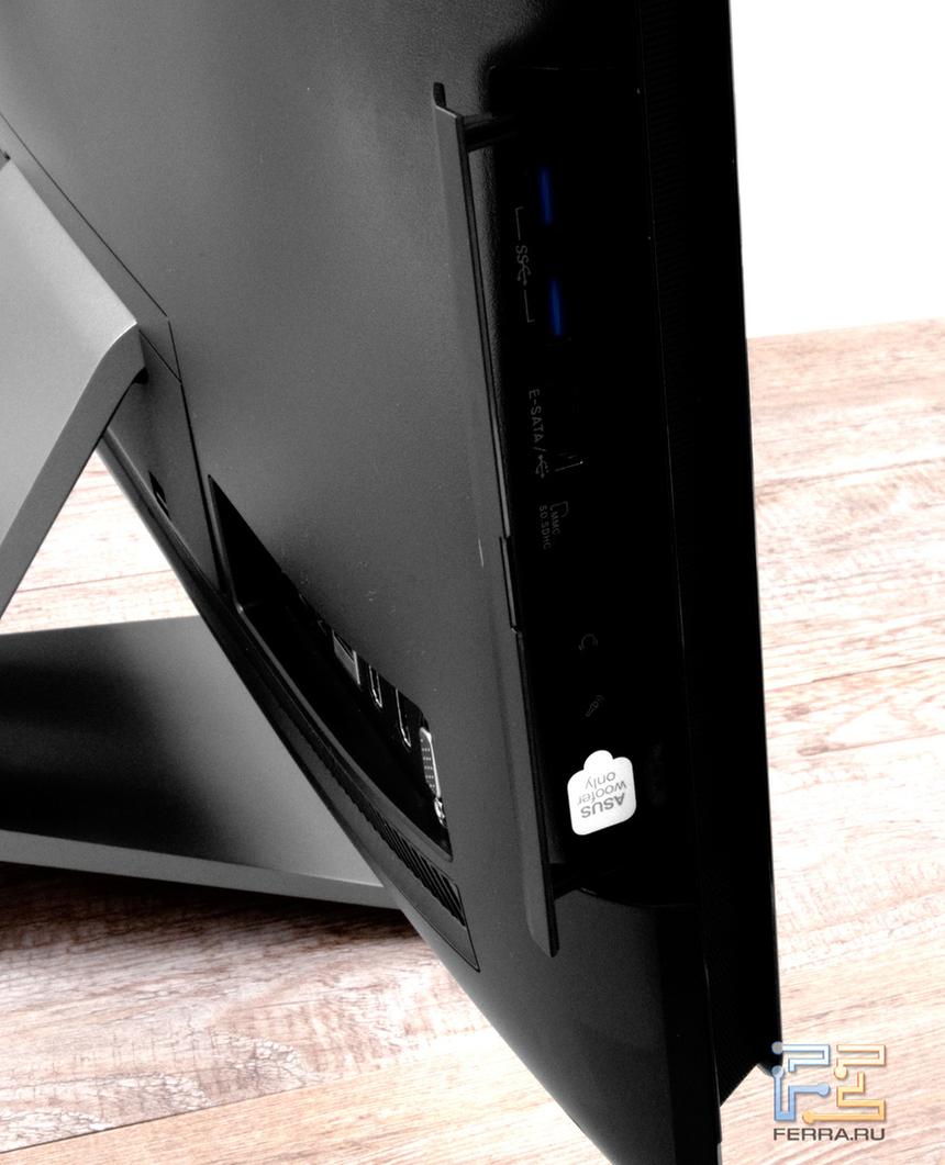 Левый торец ASUS ET2411: два USB, карт-ридер, выход для наушников, вход для микрофона, выход для сабвуфера